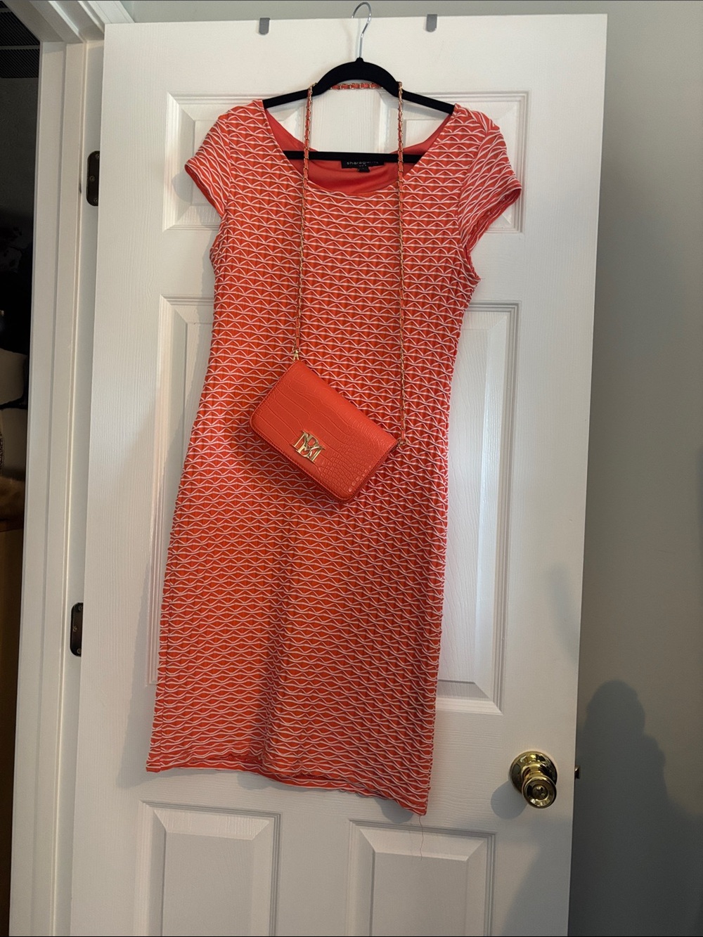 Orange Patterned Knit Sheath Dress With Matching Purse